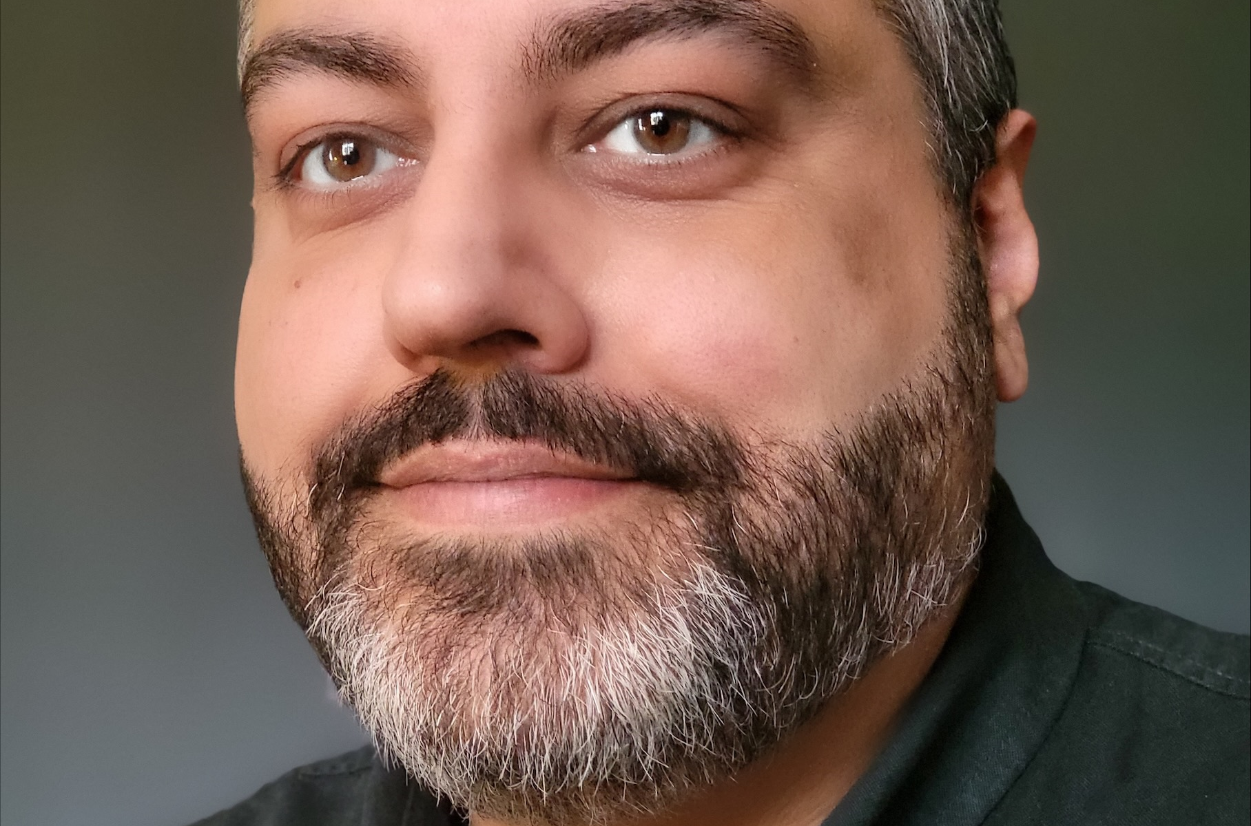 A headshot of Tony