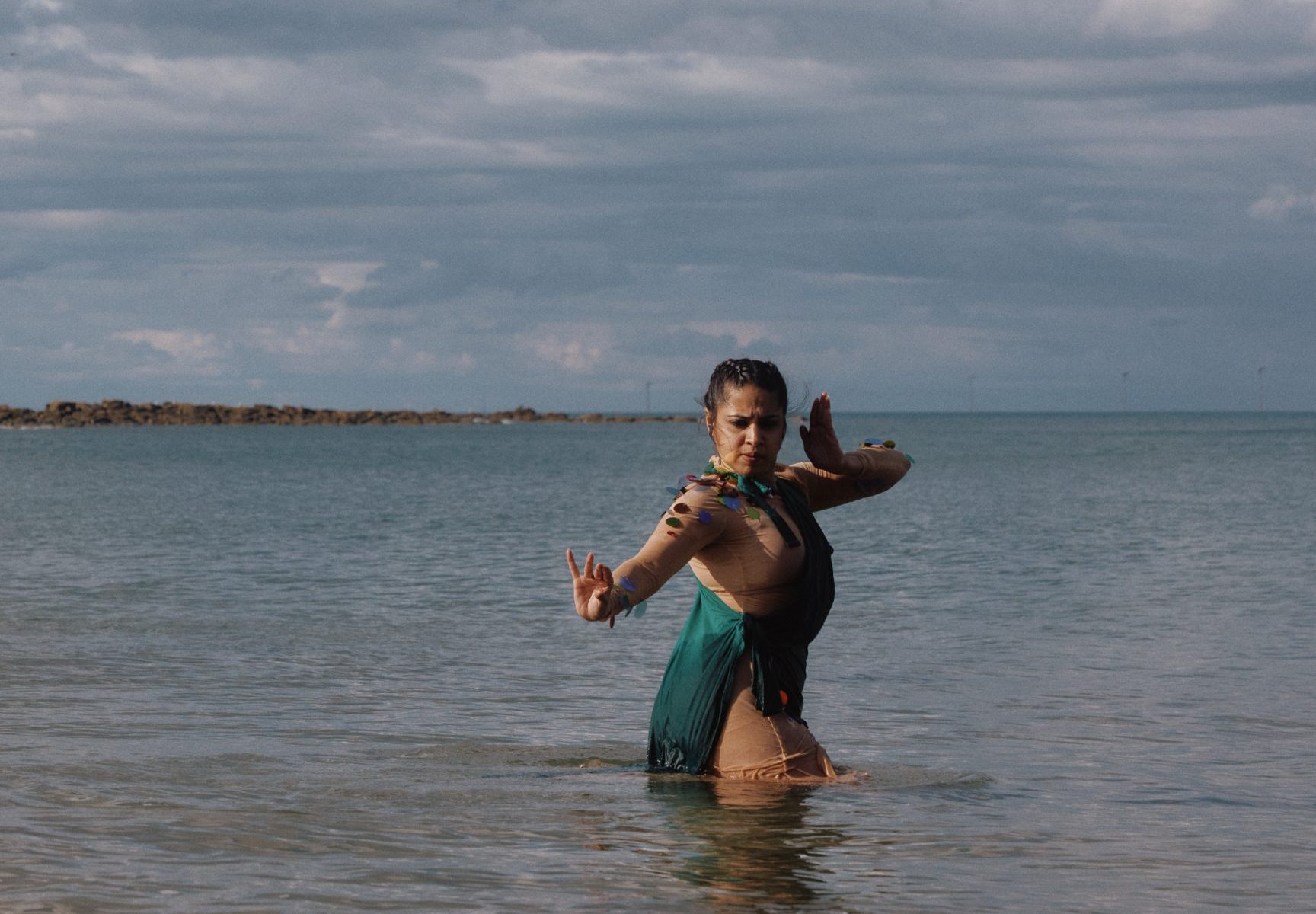 Payal dancing in the ocean.